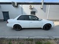 1998 Toyota Corolla VIII (E110) Рестайлинг, белый - вид 1