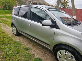 2011 Nissan Note I Рестайлинг, серебристый, 725000 рублей, вид 2