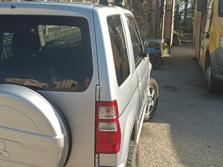 2010 Mitsubishi Pajero Mini II, серебристый, 670000 рублей, вид 4