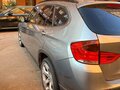 2012 BMW X1 20i I (E84), серый - вид 6