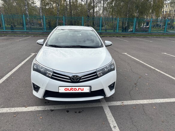 2013 Toyota Corolla XI (E160, E170, E180), белый, 1050000 рублей - вид 1