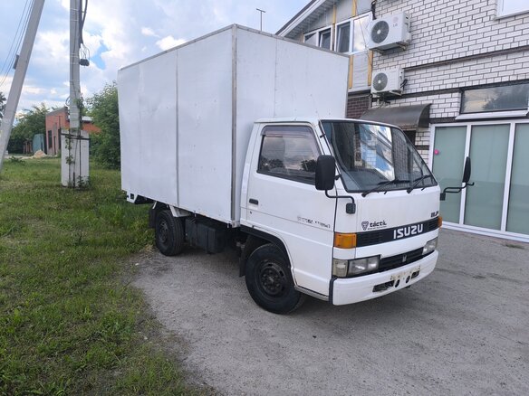 1991 Isuzu Elf (N-series), белый, 465000 рублей - вид 9