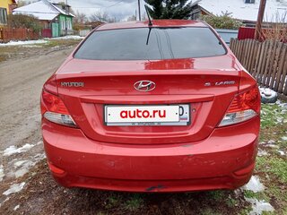 2012 Hyundai Solaris I, пурпурный, 750000 рублей, вид 3