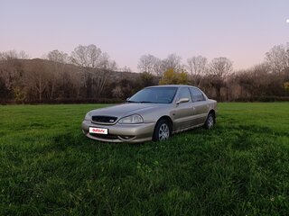 2001 Kia Clarus II, бежевый, 300000 рублей, вид 1