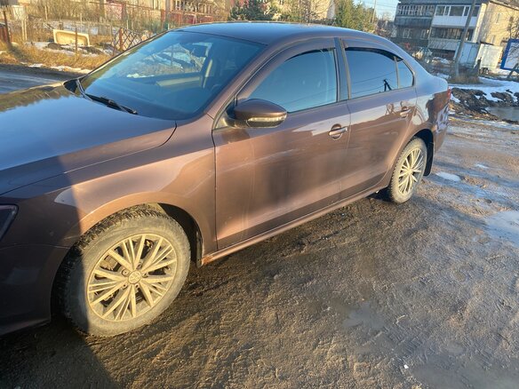 2016 Volkswagen Jetta VI Рестайлинг, коричневый, 850000 рублей - вид 5