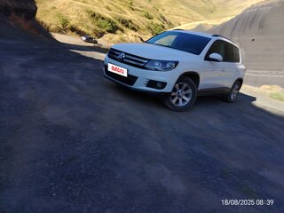 2011 Volkswagen Tiguan I Рестайлинг, белый, 1030000 рублей, вид 2