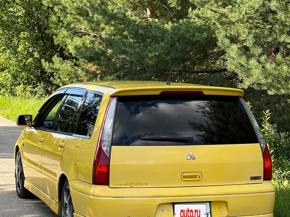 2002 Mitsubishi Lancer Cedia IX, жёлтый, 600000 рублей - вид 2