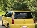 2002 Mitsubishi Lancer Cedia IX, жёлтый, 600000 рублей - вид 2