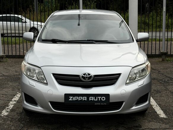 2008 Toyota Corolla X (E140, E150), серебристый - вид 1