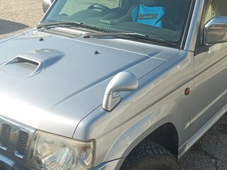 2010 Mitsubishi Pajero Mini II, серебристый, 670000 рублей, вид 2
