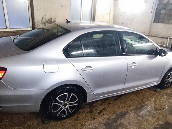 2014 Volkswagen Jetta VI Рестайлинг, серебристый, 850000 рублей - вид 3