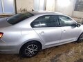2014 Volkswagen Jetta VI Рестайлинг, серебристый, 850000 рублей - вид 3