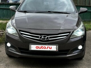 2014 Hyundai Solaris I Рестайлинг, коричневый, 720000 рублей, вид 2