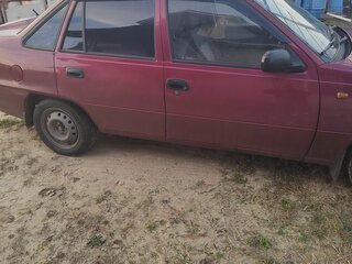 2009 Daewoo Nexia I Рестайлинг, пурпурный, 160000 рублей, вид 2