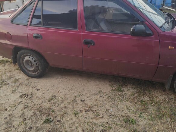 2009 Daewoo Nexia I Рестайлинг, пурпурный, 160000 рублей - вид 1