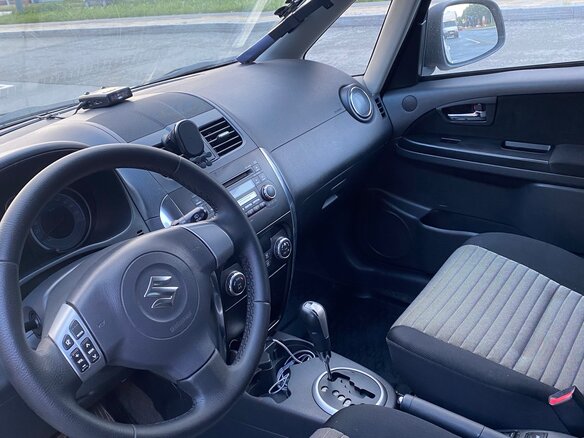 2011 Suzuki SX4 I (Classic) Рестайлинг, серебристый - вид 4