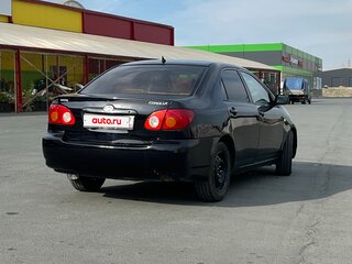 2003 Toyota Corolla IX (E120, E130), чёрный, 310000 рублей, вид 3