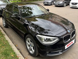2012 BMW 1 серии 118i II (F20/F21), чёрный, 1285000 рублей, вид 1
