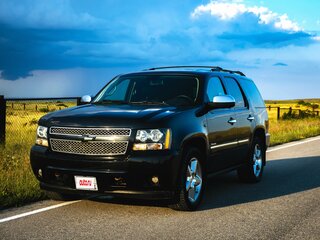 2012 Chevrolet Tahoe 6AT III, чёрный, 2100000 рублей, вид 1