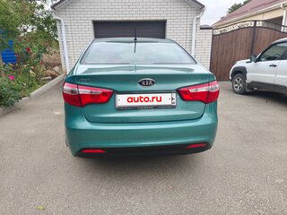2012 Kia Rio 5-speed III, зелёный, 650000 рублей, вид 5