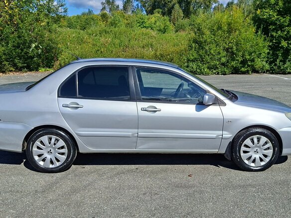 2007 Mitsubishi Lancer IX Рестайлинг, серебристый, 349000 рублей - вид 4