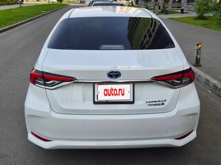 2022 Toyota Corolla XII (E210), белый, 1490000 рублей, вид 3