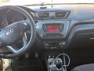 2012 Kia Rio 5-speed III, серый, 650000 рублей, вид 5