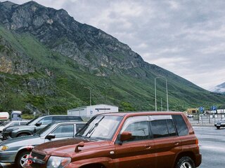 2004 Mitsubishi Pajero iO, красный, 900000 рублей, вид 3