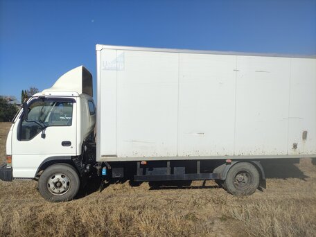 2001 Isuzu Elf (N-series), белый, 1350000 рублей, вид 5