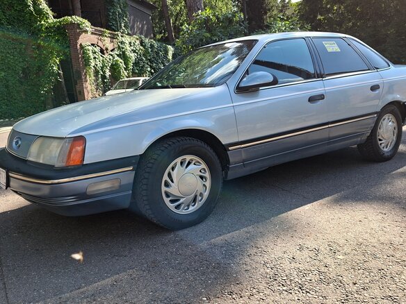 1986 Ford Taurus I, белый - вид 3
