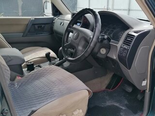 2003 Mitsubishi Pajero III Рестайлинг, зелёный, 850000 рублей, вид 5