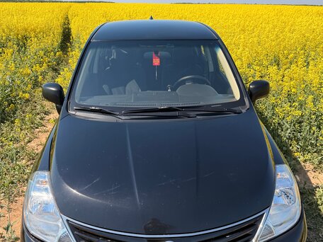 2011 Nissan Tiida I Рестайлинг, чёрный, 510000 рублей, вид 4