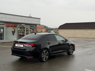 2019 Toyota Corolla XII (E210), чёрный, 1800000 рублей, вид 2