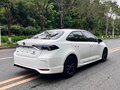 2023 Toyota Corolla XII (E210) Рестайлинг, белый - вид 3