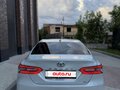 2021 Toyota Camry VIII (XV70) Рестайлинг, белый, 3400000 рублей - вид 1