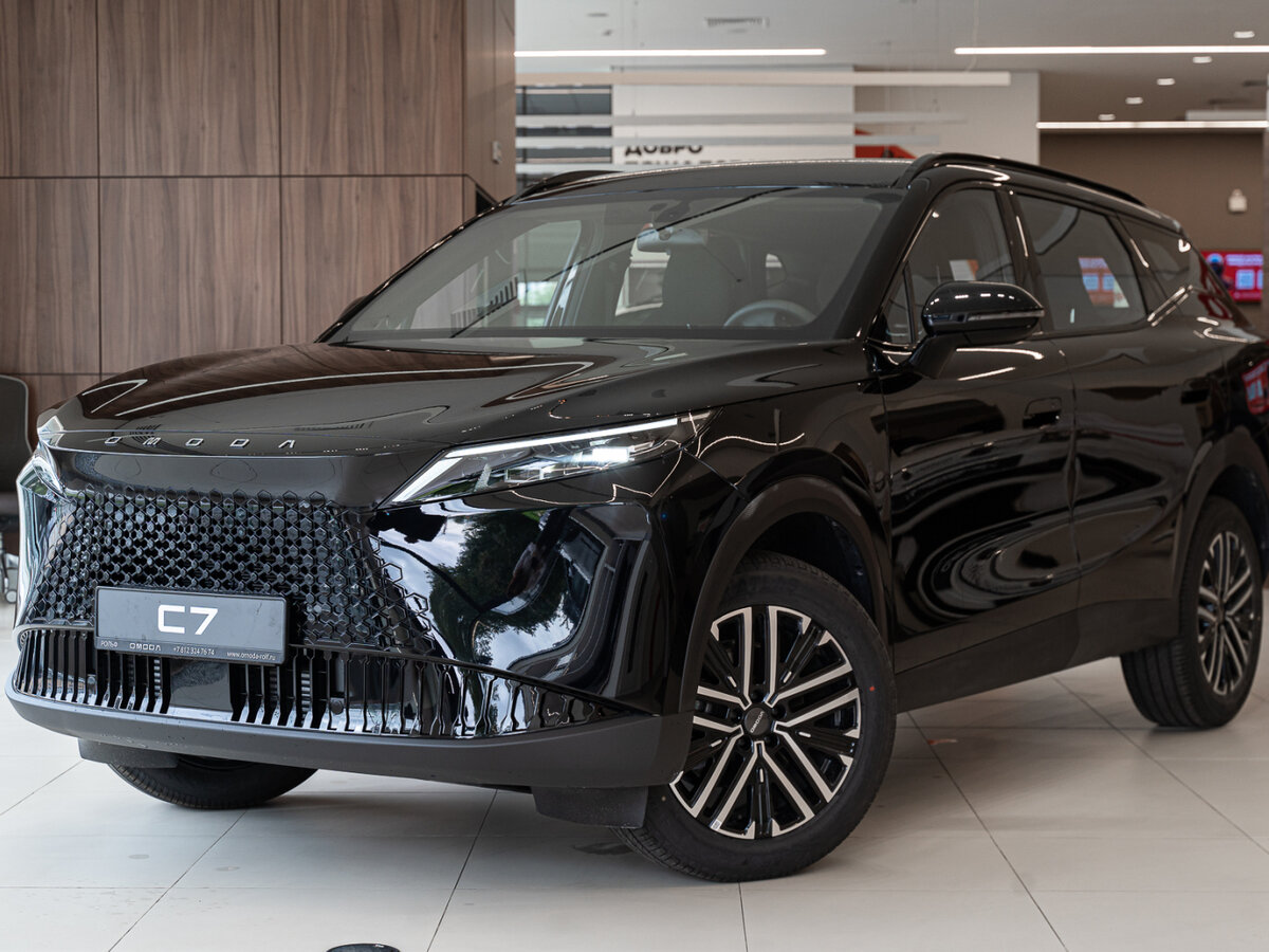 Открыть фотографии: Omoda C7