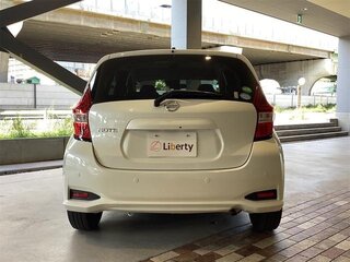 2018 Nissan Note II Рестайлинг, белый, 830007 рублей, вид 4