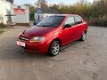 2005 Chevrolet Aveo I, красный, 300000 рублей
