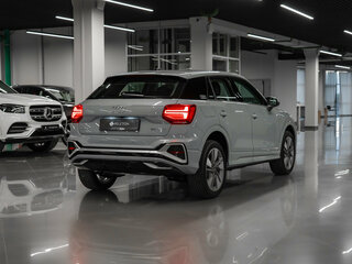 2025 Audi Q2 L 35 TFSI I Рестайлинг, серый, 3690000 рублей, вид 4