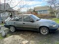 1999 Daewoo Nexia I, серый, 160000 рублей - вид 1