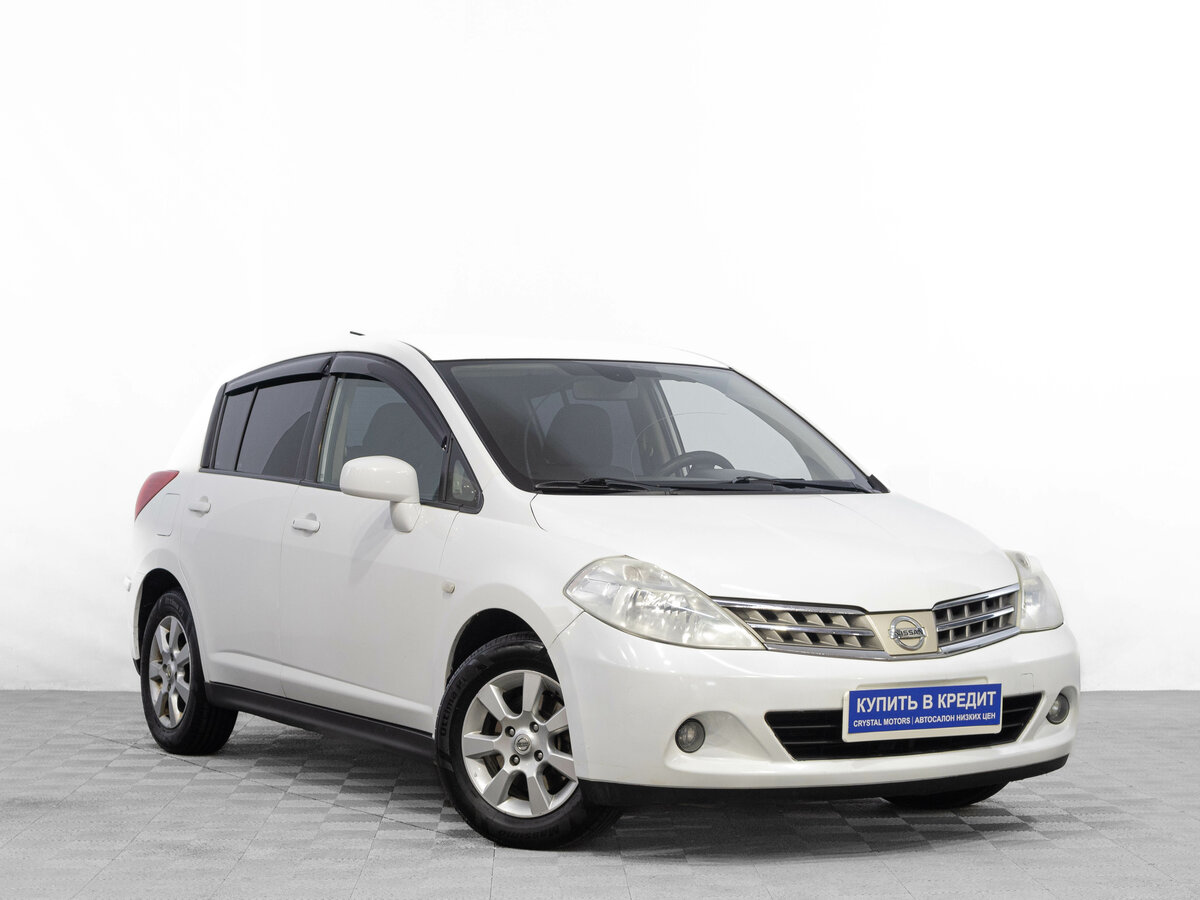 Открыть фотографии: Nissan Tiida I