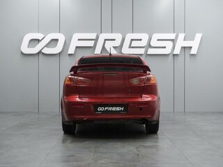 2007 Mitsubishi Lancer X, красный, 599000 рублей, вид 4