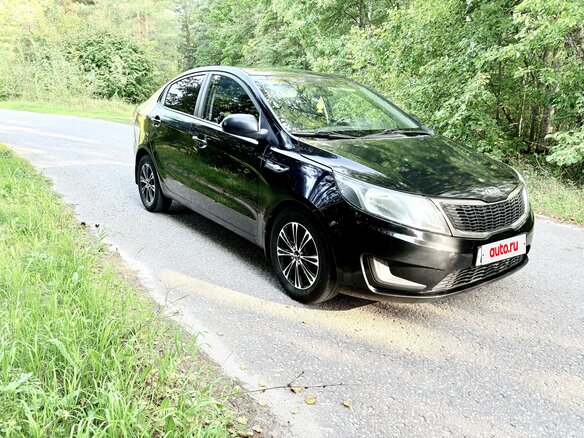 2012 Kia Rio III, чёрный - вид 1