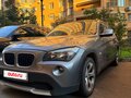 2012 BMW X1 20i I (E84), серый - вид 1