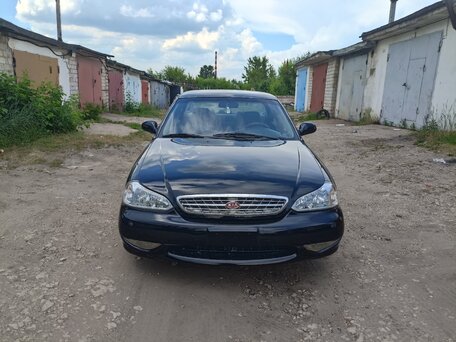 2001 Kia Clarus II, чёрный, 230000 рублей, вид 2