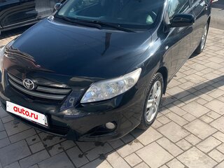 2009 Toyota Corolla X (E140, E150), чёрный, 899000 рублей, вид 1