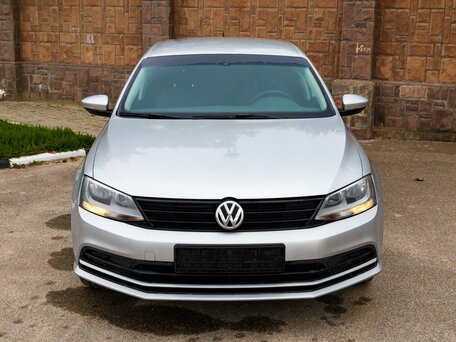 2015 Volkswagen Jetta VI Рестайлинг, серебристый, 1100000 рублей, вид 2