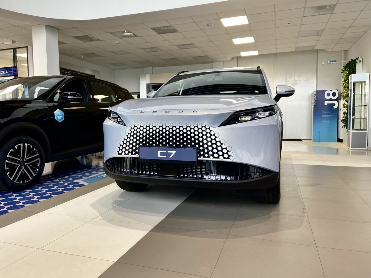 Открыть фотографии: Omoda C7