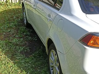 2010 Mitsubishi Lancer X, белый, 530000 рублей, вид 4