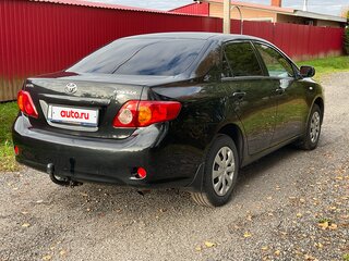 2008 Toyota Corolla X (E140, E150), чёрный, 725000 рублей, вид 4
